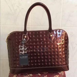 NEW Arcadia wine colored handbag